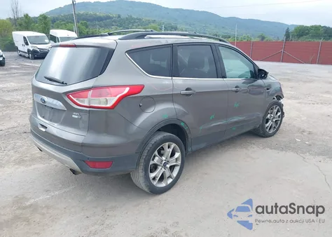 2013 Ford Escape Sel z USA, uszkodzony, nr VIN 1FMCU9H94DUD47804